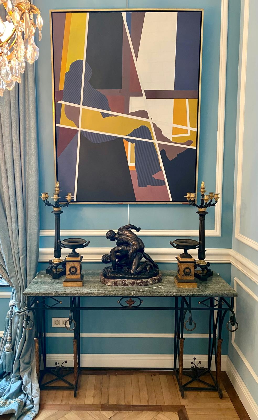 Marble top console with bronze group, candelabra and a modern painting